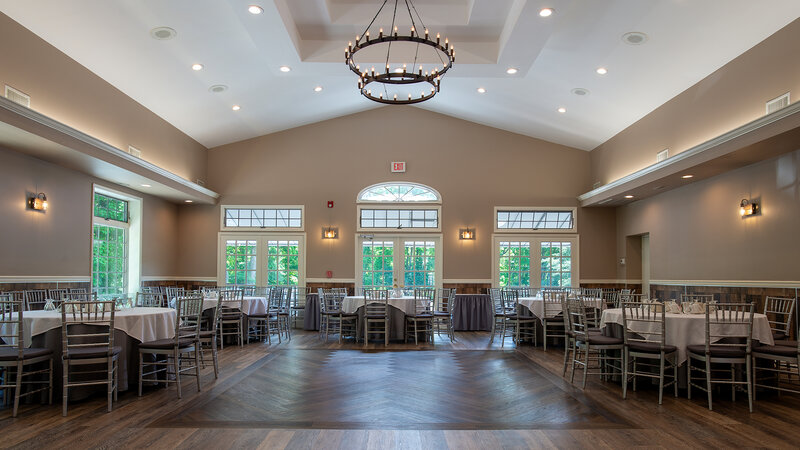 Ballroom with view of many round tables and dance floor - The Village Inn - Gallery Photo 3 Ballroom with view of many round tables and dance floor