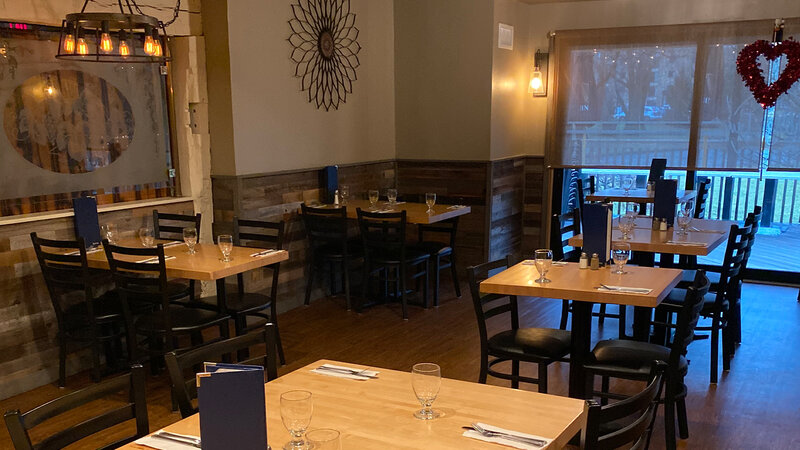 Fireplace room with view outside - The Village Inn - Gallery Photo 1 Fireplace room with view outside