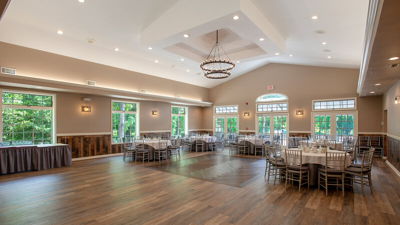 Ballroom with many set round tables - The Village Inn - Gallery Photo 1 Ballroom with many set round tables